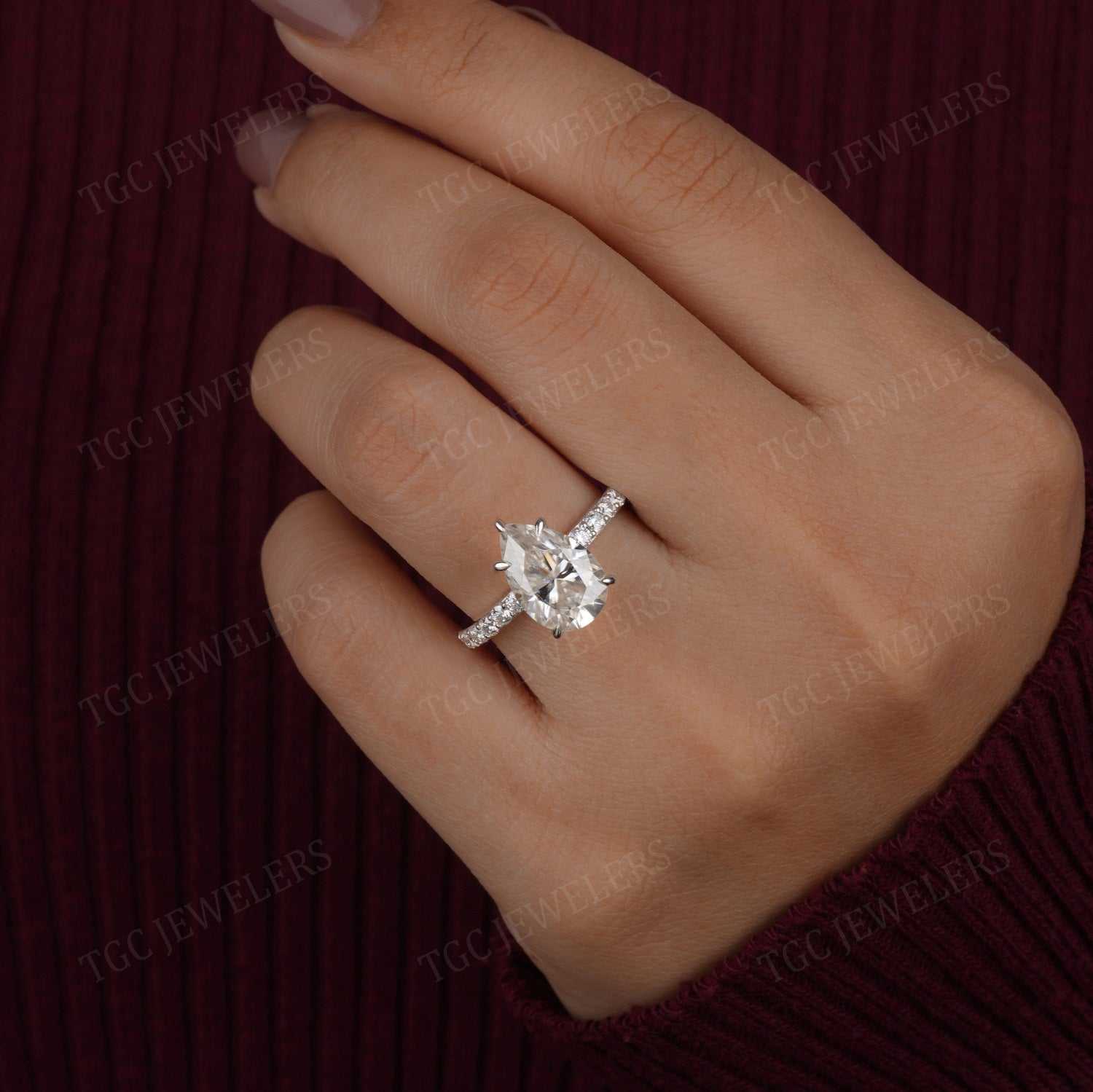 Pear Shape Hidden Halo Prong Set Moissanite Ring