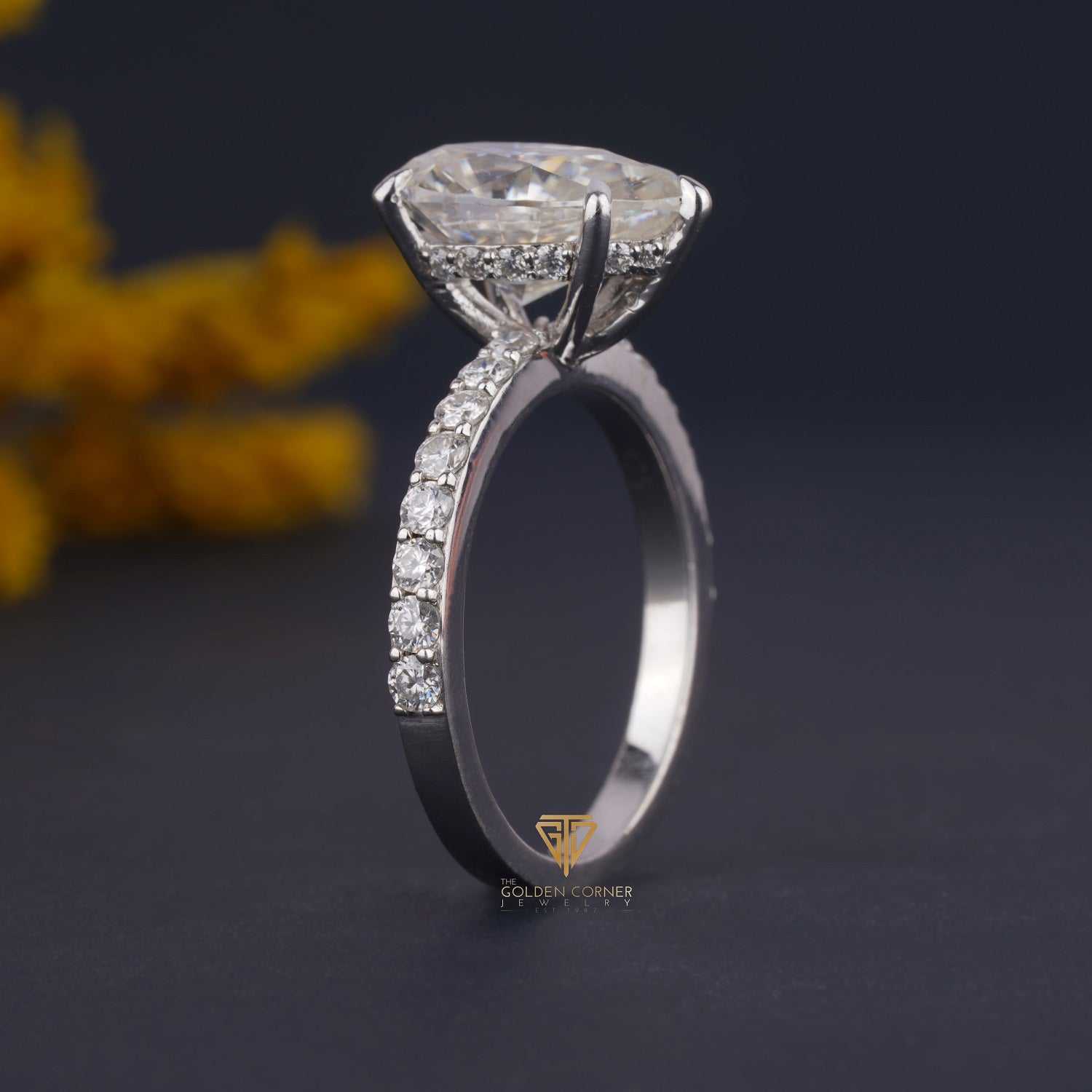 Pear Shape Hidden Halo Prong Set Moissanite Ring