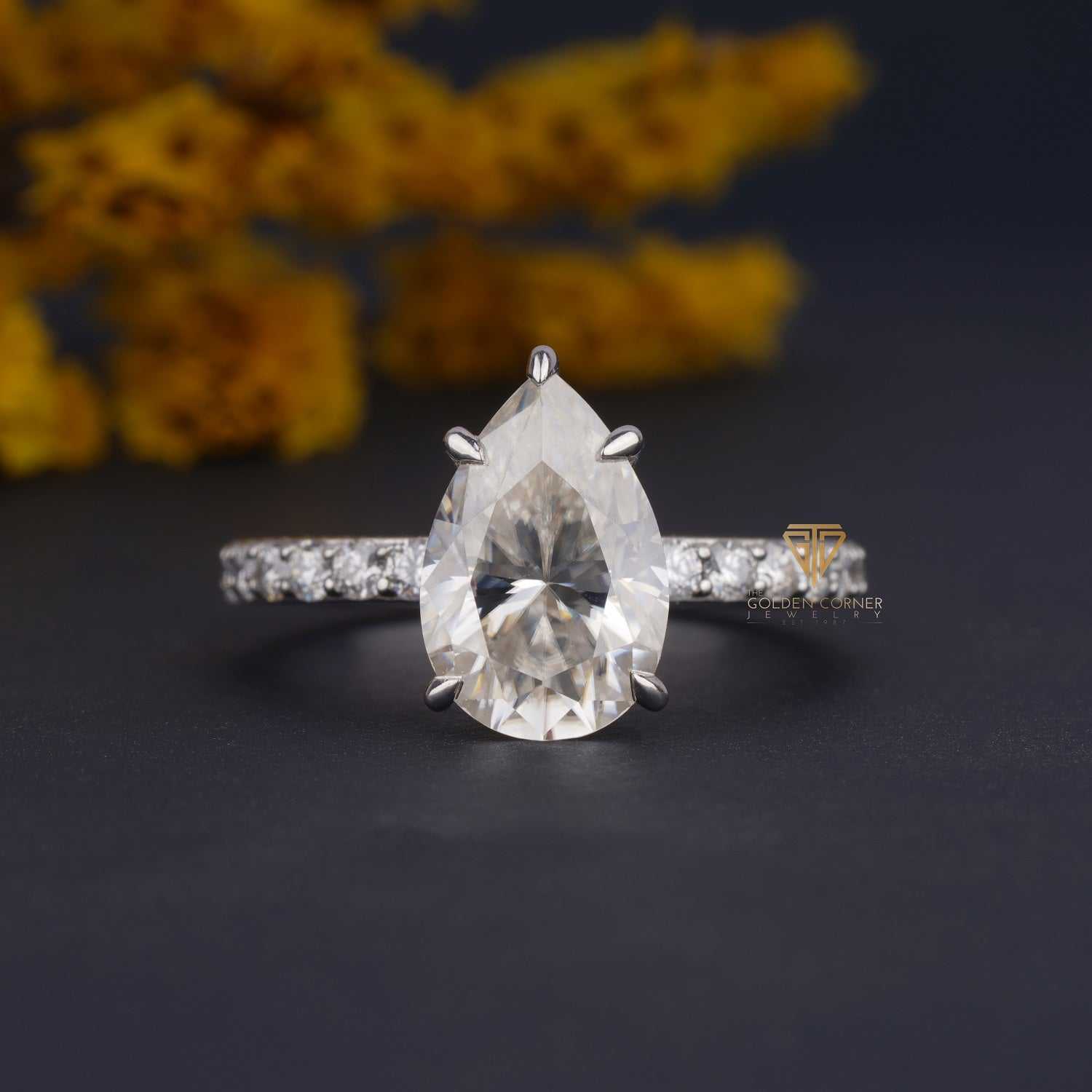 Pear Shape Hidden Halo Prong Set Moissanite Ring